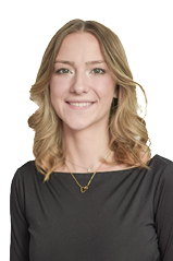 A woman wearing a black shirt. Description generated by AI