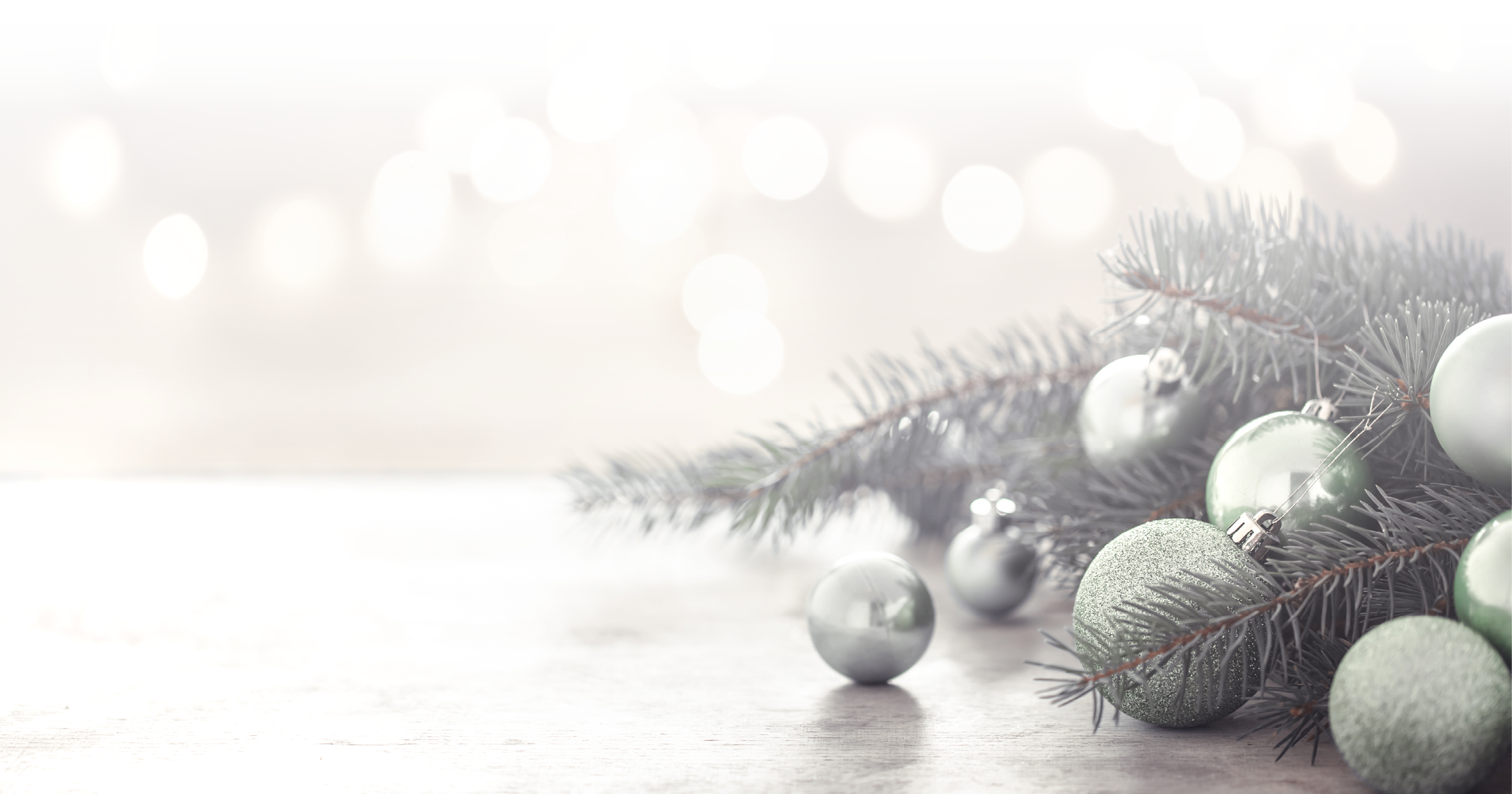 Christmas holiday background with lights, Christmas tree and Christmas balls. Advertising space.