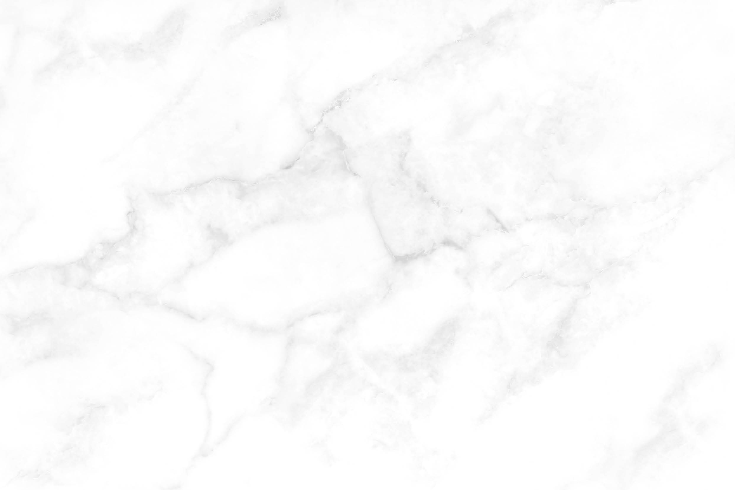 A white marble wall. Description generated by AI